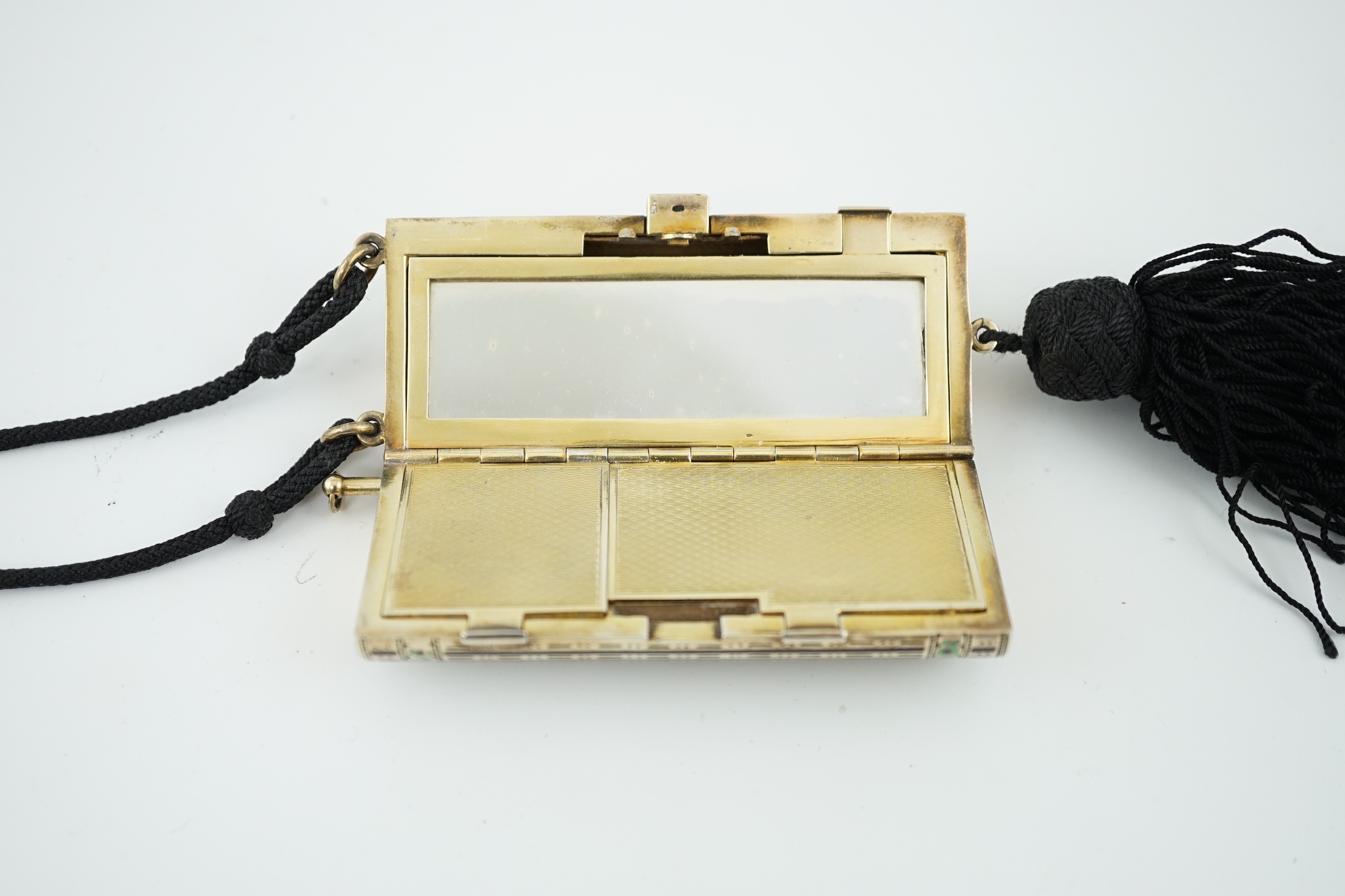 A lady's 1920's silver gilt and two colour enamel combination compact/aide memoir, import marks for Cohen & Charles